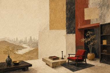 sala de estar com poltrona vermelha, estante, mesa de centro e skyline urbano visível pela janela ao fundo
